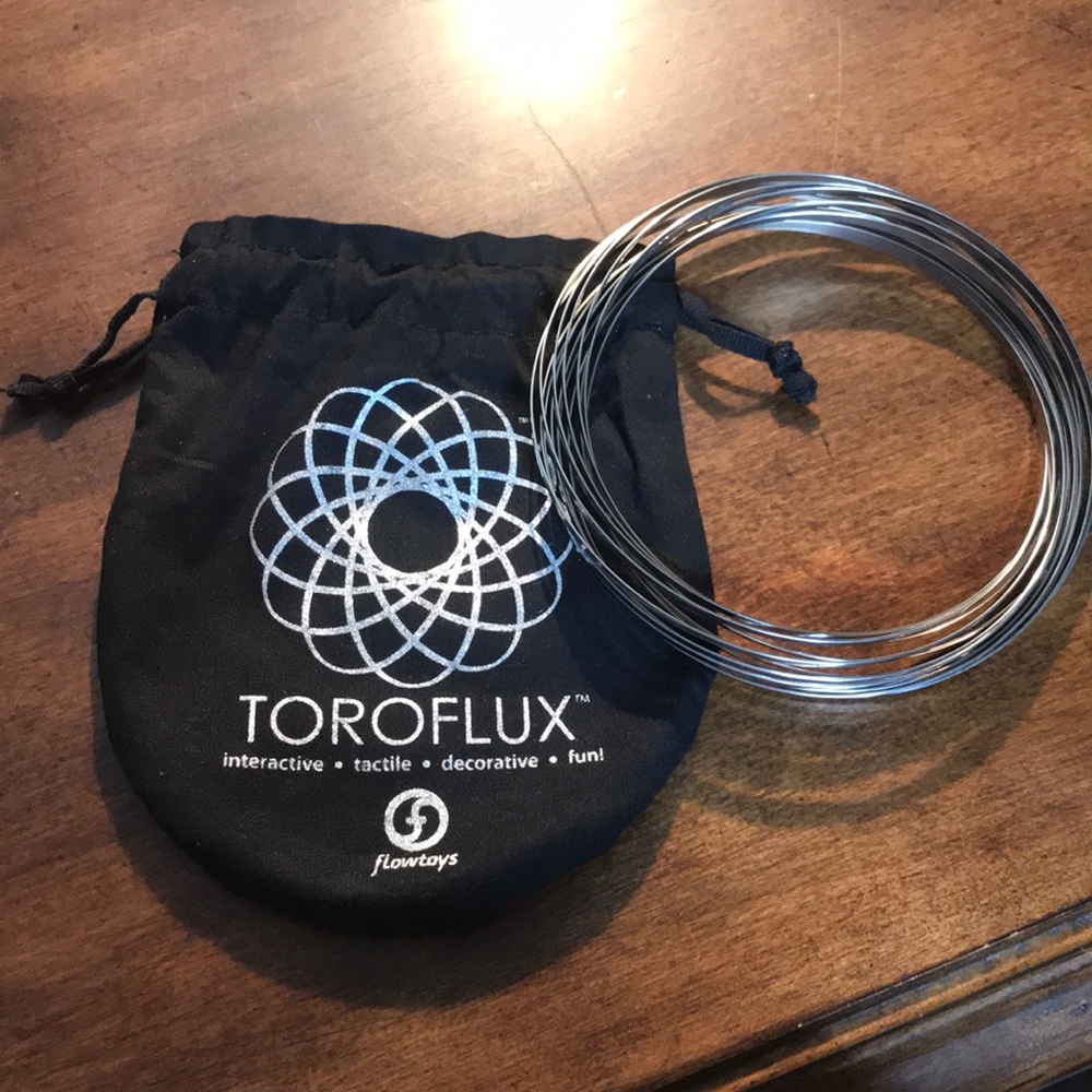 Toroflux tactile bracelet